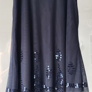 Adorable new with tags navy skirt with navy sequins at bottom size 1